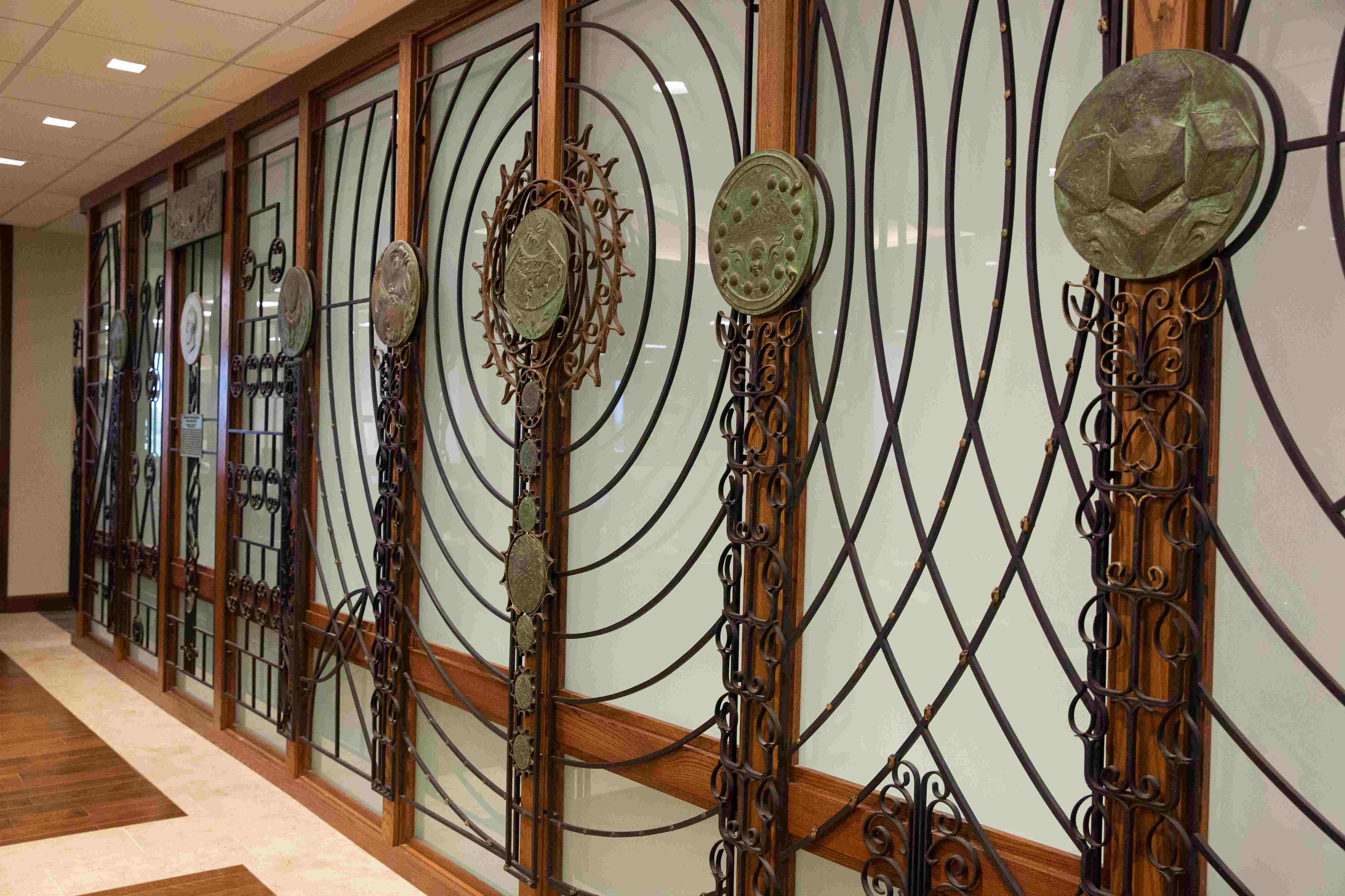 Decorative iron wall on the 5th floor of Bizzell 