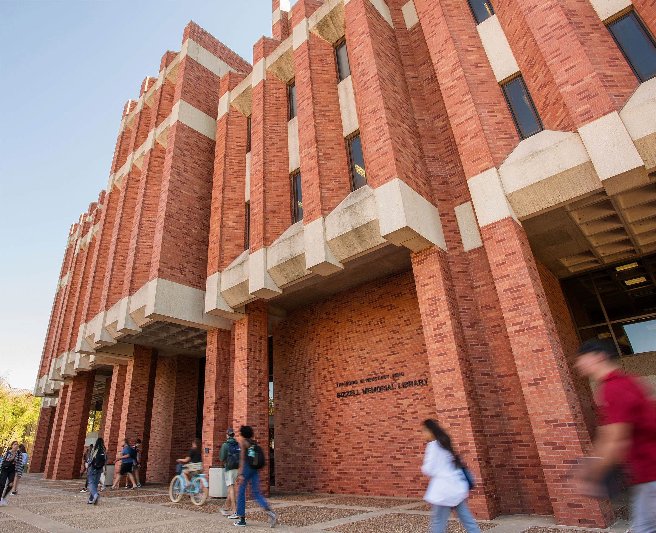 Bizzell Memorial Library low angle shot outside the west entrance showing the red brick facade.